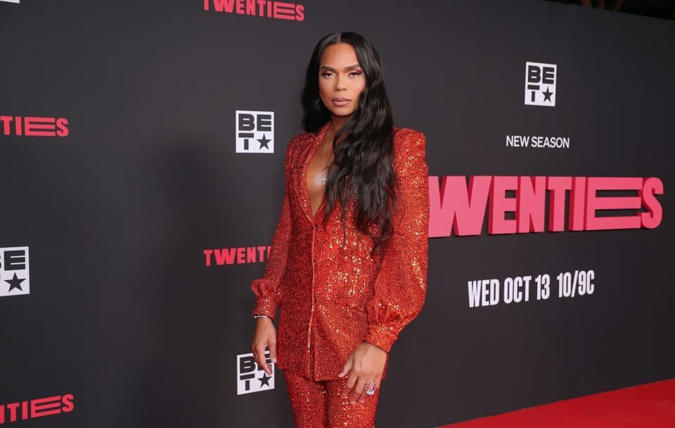 A photo of B Scott on the red carpet at the BET music awards.
