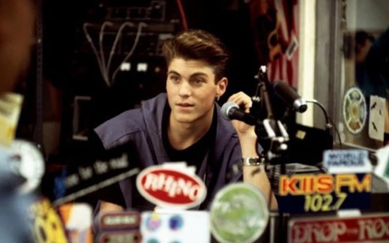 Image shows a still of the character DJ David Silver, conducting his radio show on Beverly Hills, 90210.