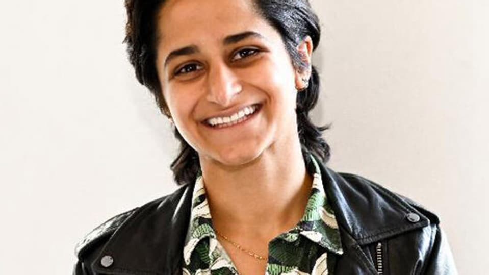 A close up of Shivani Dave smiling at the camera.