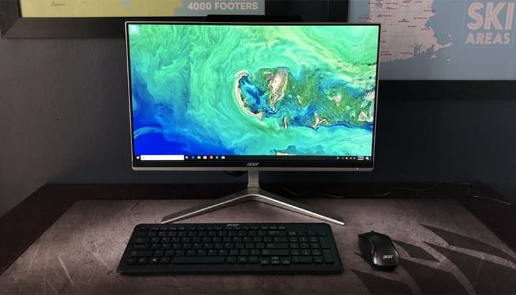 Image shows the Acer Aspire Z 24 Computer, a wireless keyboard and a wireless mouse on a desk.