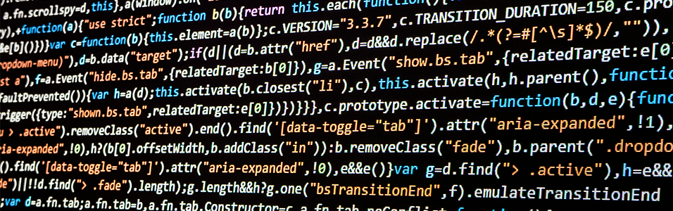 This is an image of various colourful codes all crowded together against a plain black backdrop.