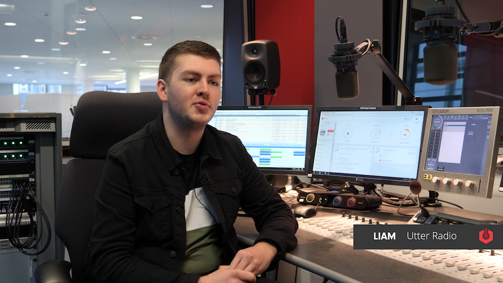 Image shows Liam, a Salford University student, in their radio studio.